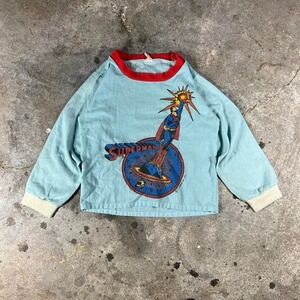 Vintage 70s youth sized Superman long sleeve sleep shirt in blue and red